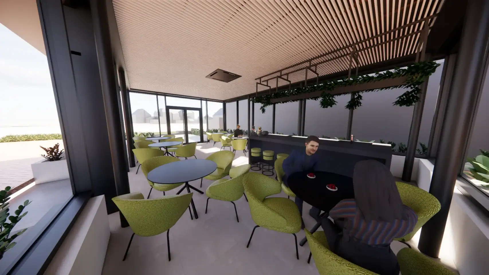 Lounge met grote ramen en groene stoelen, uitzicht op de omgeving.